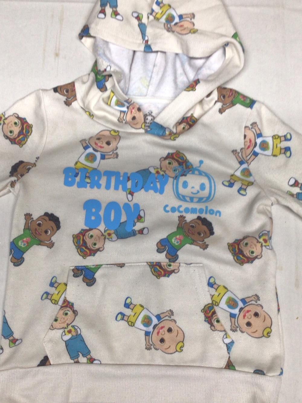 Old Navy Cream Hoodie with Blue "Birthday Boy" Cocomelon Graphic
